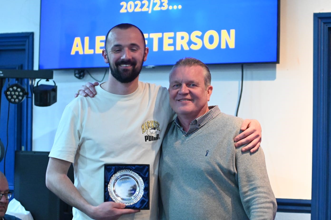 Chairman James Rogers presents Alex Peterson with the Board Player of the Year award